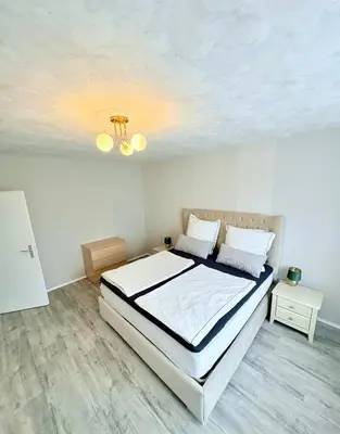 Ein Bett oder Betten in einem Zimmer der Unterkunft RelaxStay - SkyView - Smart-TV - WiFi