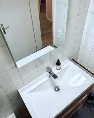 Ein Badezimmer in der Unterkunft RelaxStay - SkyView - Smart-TV - WiFi
