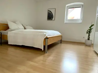 Ein Bett oder Betten in einem Zimmer der Unterkunft Apartment Katz