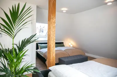 Ein Bett oder Betten in einem Zimmer der Unterkunft Citynest - Modern & gemütlich