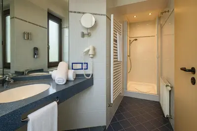 Ein Badezimmer in der Unterkunft AR Boutique Hotel Mannheim