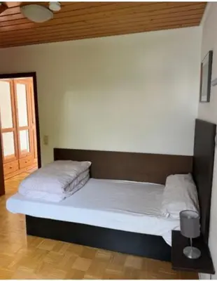 Ein Bett oder Betten in einem Zimmer der Unterkunft Zum Griechen Restaurant und Pension