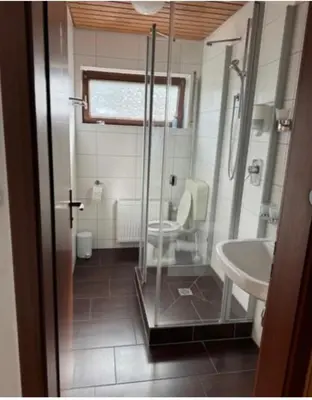 Ein Badezimmer in der Unterkunft Zum Griechen Restaurant und Pension
