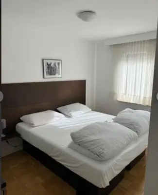 Ein Bett oder Betten in einem Zimmer der Unterkunft Zum Griechen Restaurant und Pension