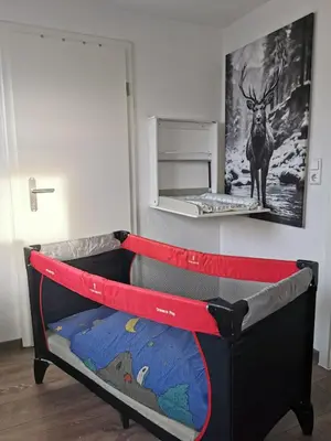 Ein Bett oder Betten in einem Zimmer der Unterkunft Ferienwohnung Odenwaldwellness