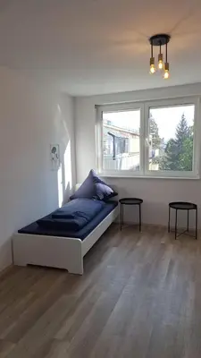 Ein Bett oder Betten in einem Zimmer der Unterkunft Monteurwohnung Pforzheim - L8 Street