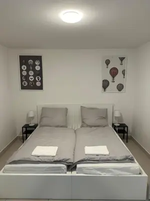 Ein Bett oder Betten in einem Zimmer der Unterkunft Zentrale Wohnung in Ludwigsburg Mitte