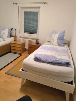 Ein Bett oder Betten in einem Zimmer der Unterkunft Weinbergblick
