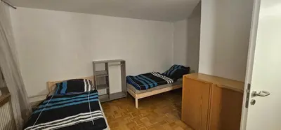 Ein Bett oder Betten in einem Zimmer der Unterkunft Ruhige Wohnung im Obergeschoss