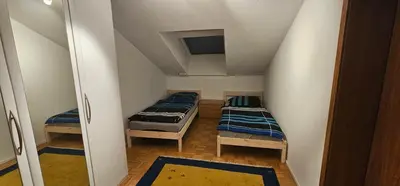 Ein Bett oder Betten in einem Zimmer der Unterkunft Ruhige Wohnung im Obergeschoss