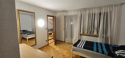 Ein Bett oder Betten in einem Zimmer der Unterkunft Ruhige Wohnung im Obergeschoss