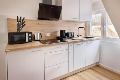 Küche/Küchenzeile in der Unterkunft Design Apartment mit Kingsize-Betten & Balkon