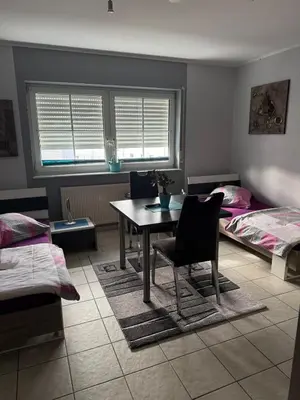 Ein Sitzbereich in der Unterkunft Apartment for 2 people Zimmervermietung Lang