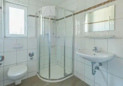 Ein Badezimmer in der Unterkunft Heilbronner Pension am schönen Theater