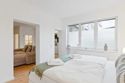 Ein Bett oder Betten in einem Zimmer der Unterkunft Zentrale Lage, Spülmaschine, Kingsize Bett, Netflix
