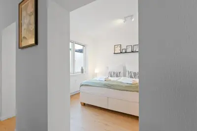 Ein Bett oder Betten in einem Zimmer der Unterkunft Zentrale Lage, Spülmaschine, Kingsize Bett, Netflix