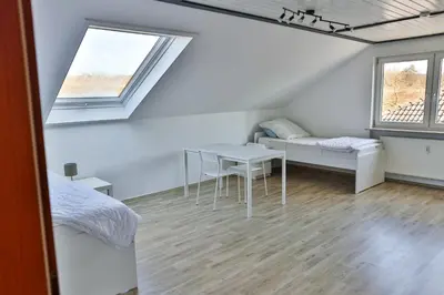 Ein Bett oder Betten in einem Zimmer der Unterkunft Ferienwohnung Höger Monteurwohnung