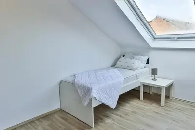 Ein Bett oder Betten in einem Zimmer der Unterkunft Ferienwohnung Höger Monteurwohnung