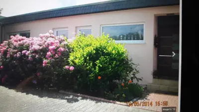 Ein Garten an der Unterkunft Gemütliche Unterkunft