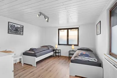 Ein Bett oder Betten in einem Zimmer der Unterkunft SE01 Work & Stay in Pfungstadt