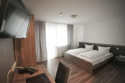 Ein Bett oder Betten in einem Zimmer der Unterkunft Hotel Altavilla
