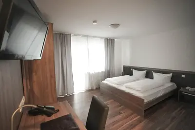 Ein Bett oder Betten in einem Zimmer der Unterkunft Hotel Altavilla