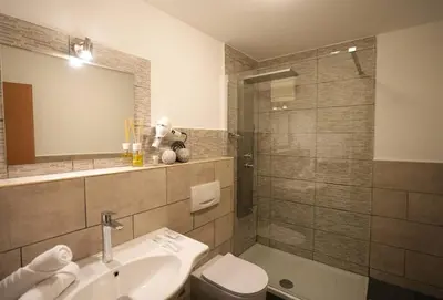 Ein Badezimmer in der Unterkunft Hotel Altavilla