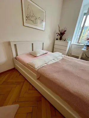 Ein Bett oder Betten in einem Zimmer der Unterkunft Zentrales, charmantes Zimmer direkt an der Universitätsklinik Mainz