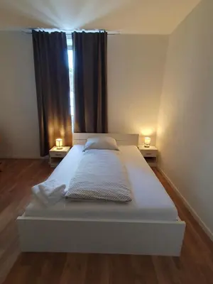 Ein Bett oder Betten in einem Zimmer der Unterkunft Zentrales, charmantes Zimmer direkt an der Universitätsklinik Mainz