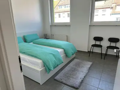Ein Bett oder Betten in einem Zimmer der Unterkunft 2-Zimmer Wohnung Würzburger Straße - Innenstadtlage Aschaffenburg