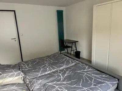 Ein Bett oder Betten in einem Zimmer der Unterkunft Haus Anna Bensheim
