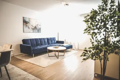 Ein Sitzbereich in der Unterkunft Exklusives Apartment Sinsheim Luxus, 75 TV & Top Lage WeHome Premium