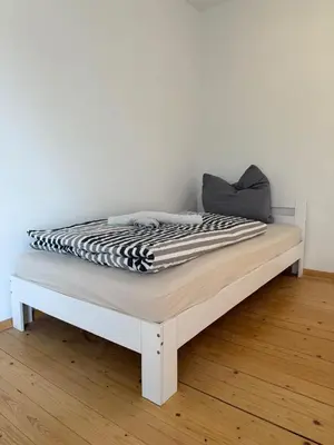 Ein Bett oder Betten in einem Zimmer der Unterkunft Monteur- und Ferienwohnung Landau - Südliche Weinstraße