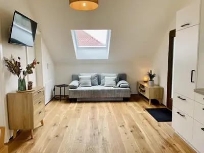 Ein Sitzbereich in der Unterkunft Ferienwohnung Weingut Braun & Söhne