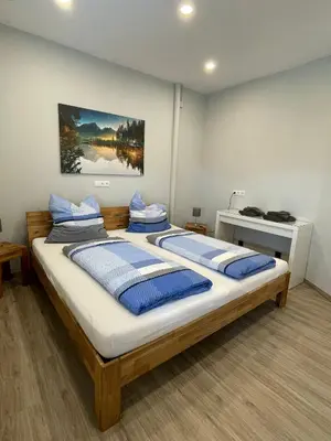 Ein Bett oder Betten in einem Zimmer der Unterkunft Haus Gerda