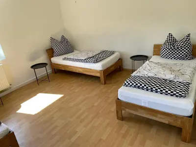Ein Bett oder Betten in einem Zimmer der Unterkunft Haus Grünwald