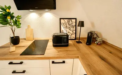 Küche/Küchenzeile in der Unterkunft Auszeit am Marktplatz - Design Ferienwohnungen mit Wohlfühlfaktor