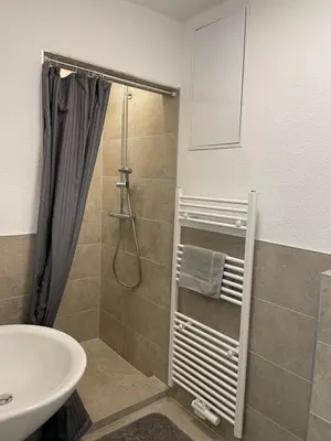 Ein Badezimmer in der Unterkunft Pension Keck im Weinsberger Tal