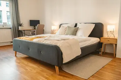 Ein Bett oder Betten in einem Zimmer der Unterkunft K15 Cozy, Unique & Spacious 3-Room Apartment with Balcony or Single Room by LIPA