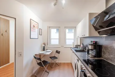 Küche/Küchenzeile in der Unterkunft Amalfi A08 - super zentral für 4PP - 2 Zimmer & Boxspringbetten