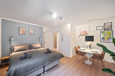 Ein Bett oder Betten in einem Zimmer der Unterkunft Amalfi A08 - super zentral für 4PP - 2 Zimmer & Boxspringbetten