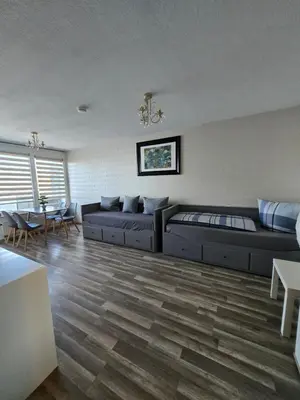 Ein Sitzbereich in der Unterkunft Apartment Katharina