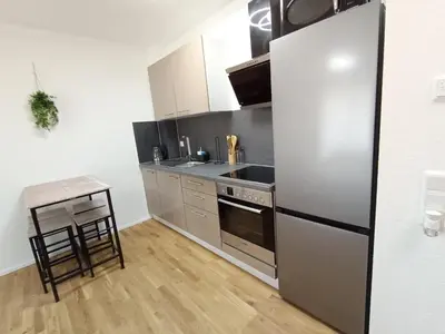 Küche/Küchenzeile in der Unterkunft WAT Wohnung KL