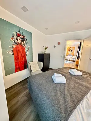 Ein Bett oder Betten in einem Zimmer der Unterkunft Stilvolle Einliegerwohnung mit Boxspringbett