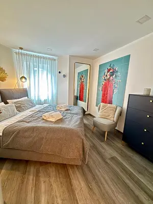 Ein Bett oder Betten in einem Zimmer der Unterkunft Stilvolle Einliegerwohnung mit Boxspringbett
