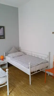 Ein Bett oder Betten in einem Zimmer der Unterkunft Pension Anna