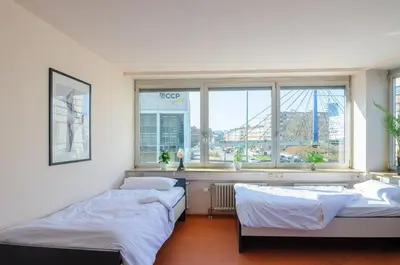 Ein Bett oder Betten in einem Zimmer der Unterkunft MZK Maier Inexpensive and central