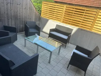 Ein Sitzbereich in der Unterkunft Luxury rooms -Guest House Bi-Bi