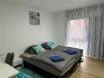 Ein Bett oder Betten in einem Zimmer der Unterkunft Luxury rooms -Guest House Bi-Bi