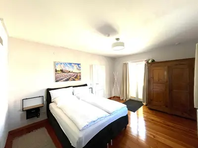 Ein Bett oder Betten in einem Zimmer der Unterkunft Ferienwohnung am Goldberg
